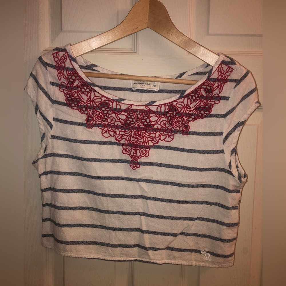 A & F cropped top.  Cotton. White with blue stripes & red embroidery